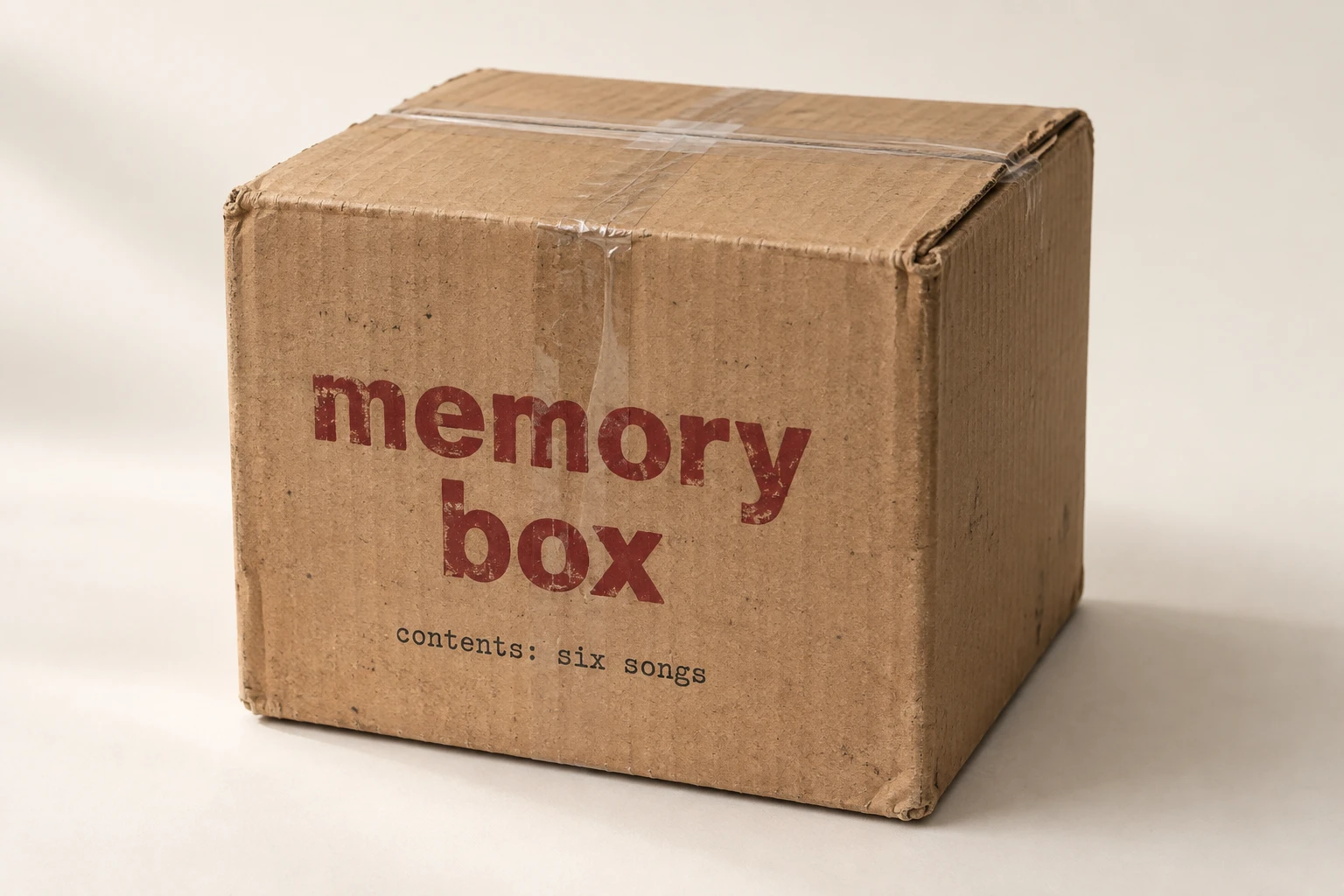 a cardboard memory box, contents: six songs